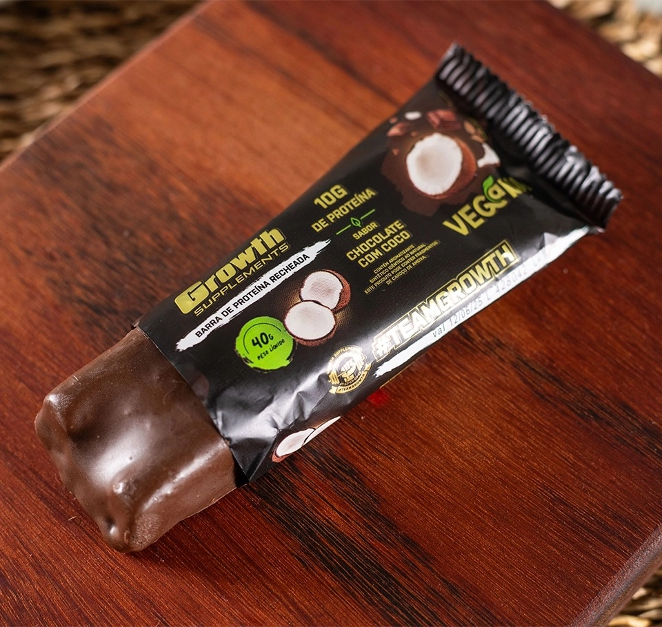Barra Vegana Growth Supplements em cima de uma tábua