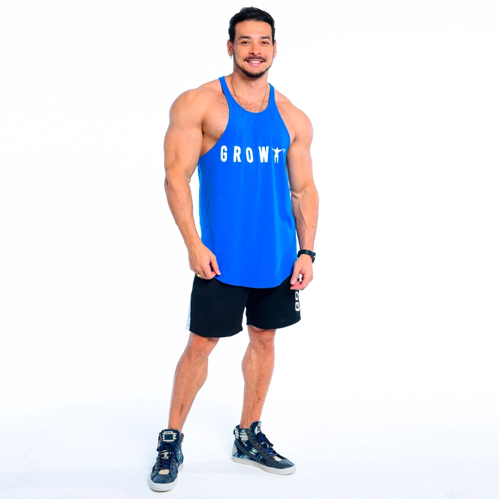 REGATA CAVADA PREMIUM LONG GROWTH MAN AZUL - GROWTH SUPPLEMENTS - visão frontal segurando a camiseta - Atleta Felipe Franco TeamGrowth