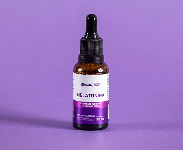 Melatonina 0,21mg 30ml sabor maracujá - growth supplements na frente e o fundo lilas