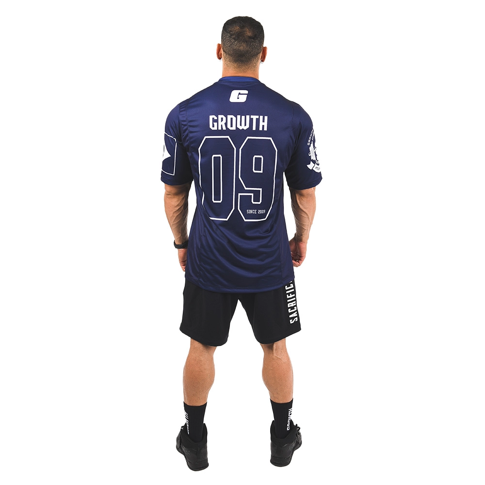 CAMISETA FUTEBOL AMERICANO ROXA SINCE 2009 GROWTH - EDIÇÃO ESPECIAL - visão de perfil - Atleta Felipe Franco TeamGrowth