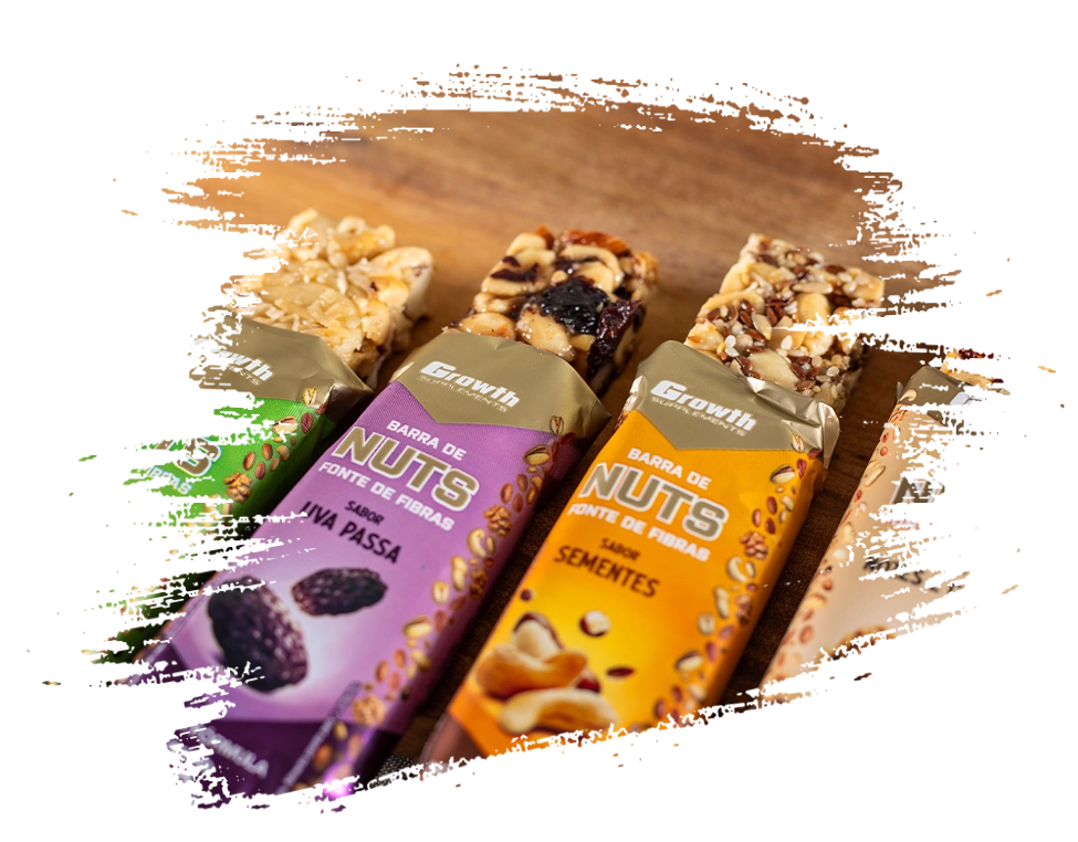 Os 4 sabres da Barra de Nuts Growth Supplements em cima de uma tábua
