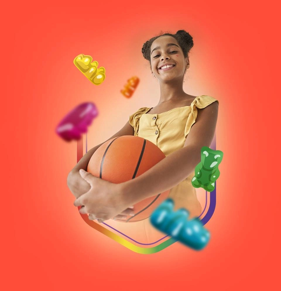 GROWTH SUPPLEMENTS - Imagem ilustrativa criança sorrindo segunrando uma bola de basquete