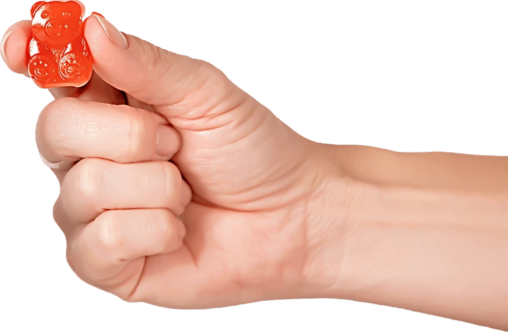 Colágeno - imagem ilustrativa de uma mão segurando suplemento gummy fibras