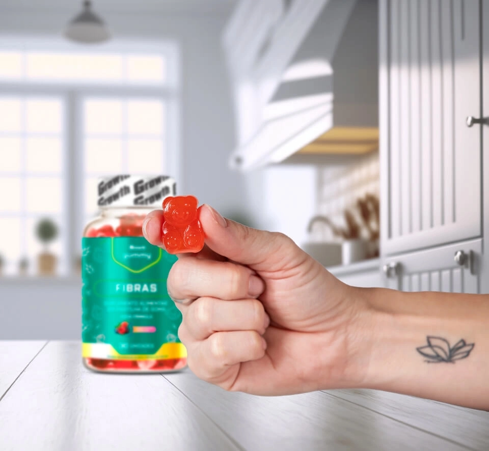 Colágeno - imagem ilustrativa de uma mão segurando suplemento gummy fibras