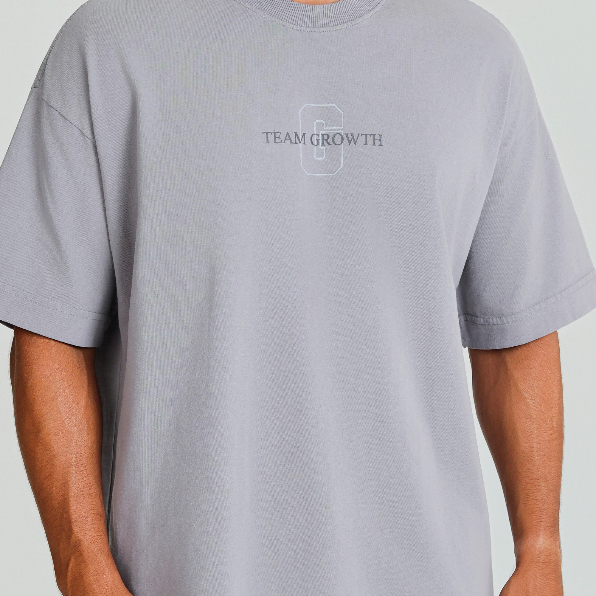 Camiseta Growth Oversized Always Earned cinza claro